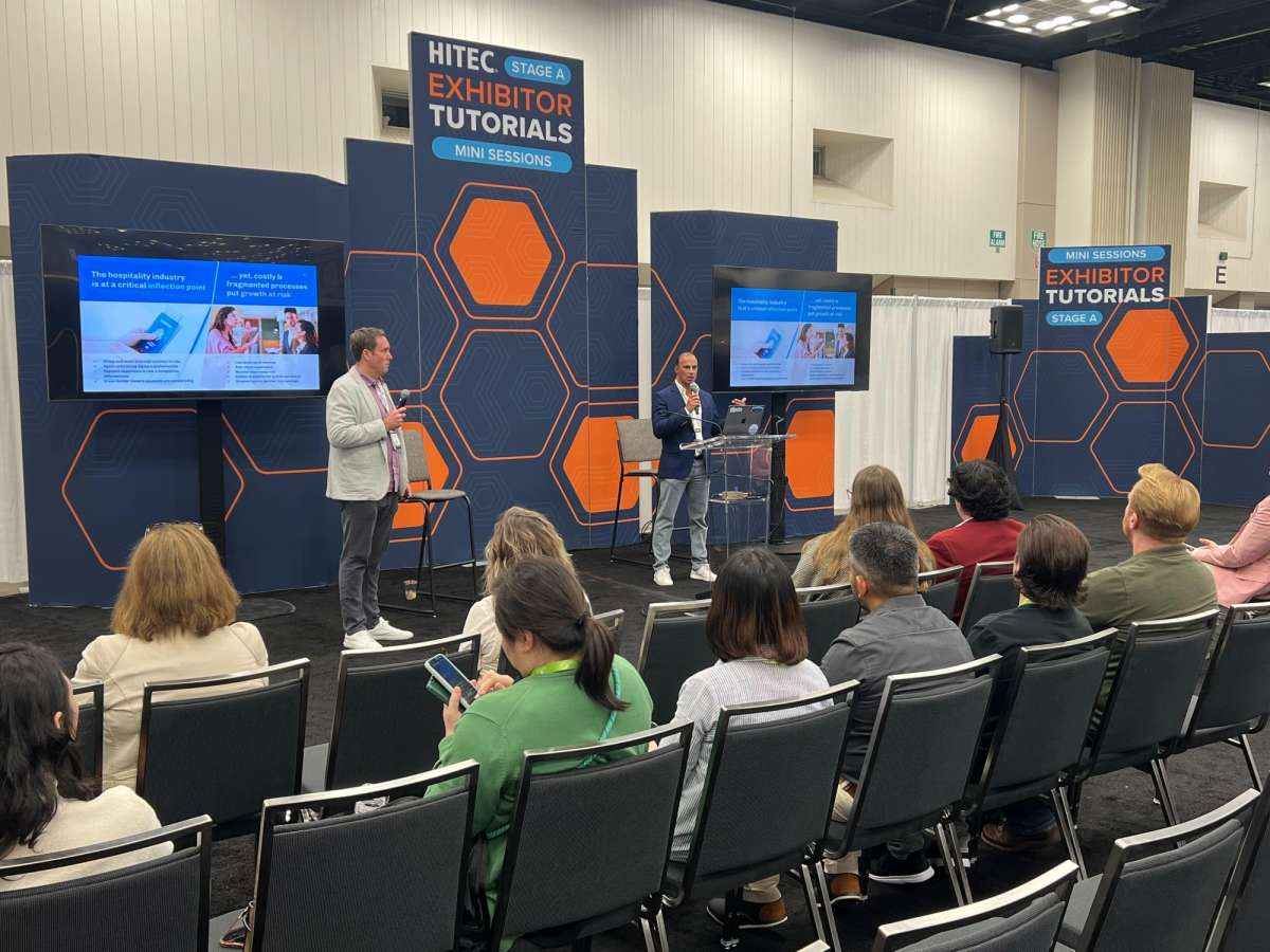 Flywire team at HITEC 2025