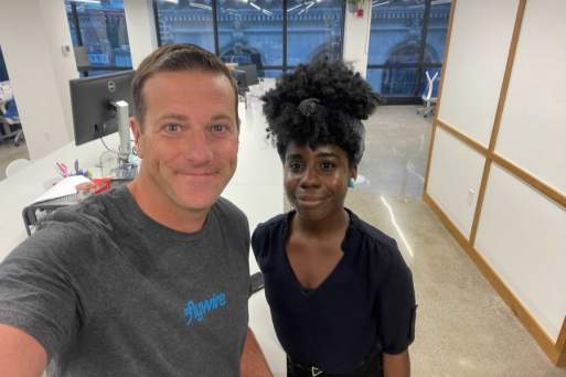 Flywire CEO Mike Massaro with employee