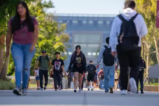 students walking on college campus