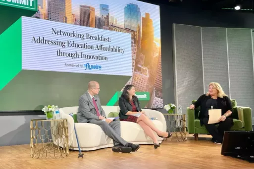 Flywire's Sharon Butler on stage at event